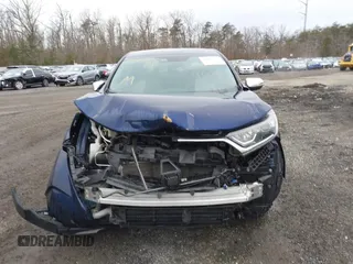 2019 Honda CR-V EX with VIN 2HKRW2H54KH630921, listed as a IAAI auction lot 41366277 with 103,075 mi miles and . Bid and sale history available at DreamBid. Image 13.