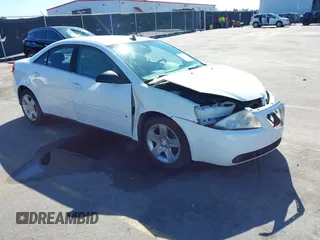 2009 Pontiac G6 w/1SA *Ltd Avail* with VIN 1G2ZG57B994169306, listed as a IAAI auction lot 41747212 with 124,298 mi miles. Bid and sale history available at carsss.com. Image 1.