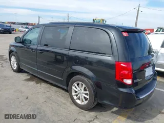 2014 Dodge Grand Caravan SXT 30th Anniversary with VIN 2C4RDGCG7ER122042, listed as a IAAI auction lot 41600892 with 101,596 mi miles. Bid and sale history available at carsss.com. Image 3.