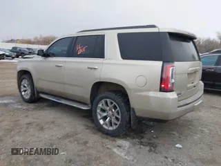 2015 GMC Yukon SLT z VIN 1GKS2BKC6FR655777, wystawiony jako IAAI lot #40982330 z przebiegiem 120 627 mil mil oraz . Historia ofert i sprzedaży dostępna na DreamBid. Obrazek 3.