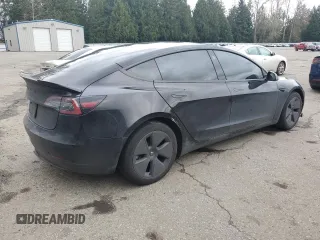 2023 Tesla Model 3 with VIN 5YJ3E1EA3PF644898, listed as a Copart auction lot 50427685 with 36,488 mi miles and Salvage Title. Bid and sale history available at DreamBid. Image 3.