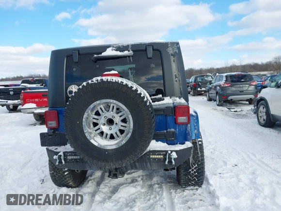 2010 Jeep Wrangler Sahara z VIN 1J4AA5D18AL170957, wystawiony jako IAAI lot #41599820 z przebiegiem 64 217 mil mil oraz . Historia ofert i sprzedaży dostępna na DreamBid. Obrazek 16.