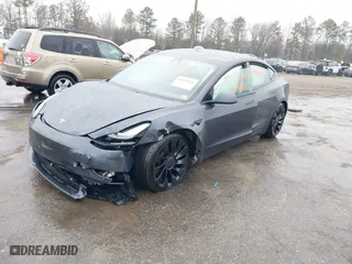 2022 Tesla Model 3 Performance with VIN 5YJ3E1EC2NF336135, listed as a IAAI auction lot 41853826 with 1 mi miles. Bid and sale history available at carsss.com. Image 19.