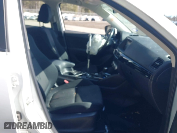 2016 Mazda CX-5 Sport with VIN JM3KE2BY9G0887110, listed as a IAAI auction lot 41761039 with 86,624 mi miles. Bid and sale history available at carsss.com. Image 5.