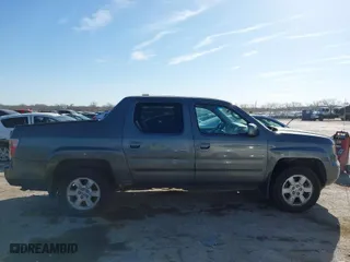 2007 Honda Ridgeline RTL w/Leather with VIN 2HJYK16547H526249, listed as a IAAI auction lot 41769625 with 173,168 mi miles. Bid and sale history available at carsss.com. Image 13.