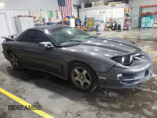 1999 Pontiac Firebird Formula с VIN 2G2FV22G1X2211237, выставлен на аукционе Copart как лот 57750415 с пробегом 134 236 миль миль и Списание • Salvage title. История ставок и продаж доступна на DreamBid. Изображение 4.