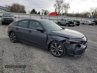 2025 Honda Civic Sport Touring z VIN 19XFL4H93SE008549, wystawiony jako Copart lot #54105755 z przebiegiem 1353 mil mil oraz Szkody całkowita. Historia ofert i sprzedaży dostępna na DreamBid. Obrazek 4.