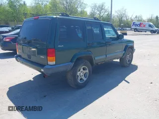 2000 Jeep Cherokee z VIN 1J4FF48S2YL253251, wystawiony jako IAAI lot #42243268 z przebiegiem 154 136 mil mil oraz . Historia ofert i sprzedaży dostępna na DreamBid. Obrazek 4.