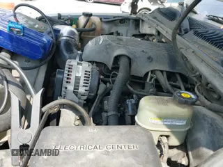 2002 Chevrolet Tahoe LT z VIN 1GNEK13Z42J197579, wystawiony jako IAAI lot #43212866 z przebiegiem 313 693 mil mil oraz . Historia ofert i sprzedaży dostępna na DreamBid. Obrazek 12.