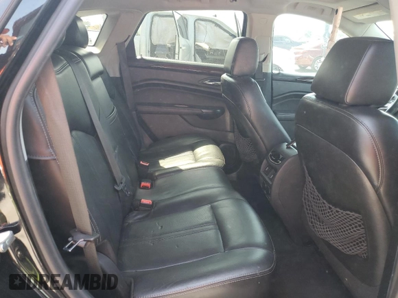 2014 Cadillac SRX Premium Collection with VIN 3GYFNDE35ES591071, listed as a Copart auction lot 57891265 with 134,560 mi miles and Salvage title. Bid and sale history available at DreamBid. Image 11.