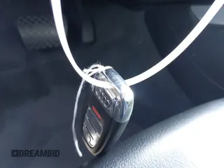 2014 Audi A5 Premium Plus z VIN WAULFAFHXEN010699, wystawiony jako IAAI lot #41868013 z przebiegiem 40 305 mil mil oraz . Historia ofert i sprzedaży dostępna na DreamBid. Obrazek 11.