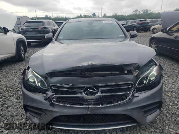 2019 Mercedes-Benz E 300 with VIN WDDZF4KB7KA553856, listed as a Copart auction lot 61025735 with 59,001 mi miles and Salvage title. Bid and sale history available at DreamBid. Image 5.