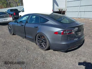 2021 Tesla Model S Long Range with VIN 5YJSA1E52MF428370, listed as a IAAI auction lot 41809773 with 34,372 mi miles and . Bid and sale history available at DreamBid. Image 3.