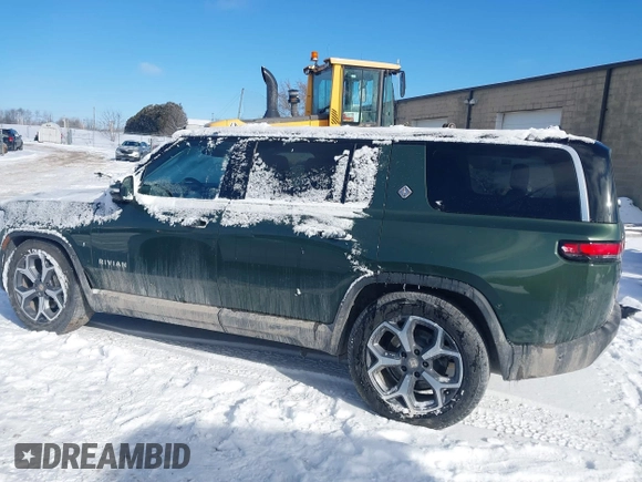 2024 Rivian R1S Adventure with VIN 7PDSGBBA9RN042780, listed as a IAAI auction lot 41440424 with 10,747 mi miles. Bid and sale history available at carsss.com. Image 15.