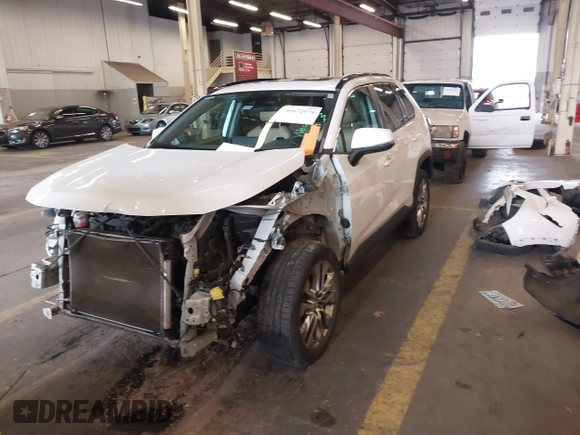 2020 Toyota RAV4 XLE Premium with VIN 2T3C1RFV1LC042163, listed as a IAAI auction lot 40672979 with 76,016 mi miles. Bid and sale history available at carsss.com. Image 23.