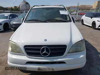2001 Mercedes-Benz M 320/430/500 with VIN 4JGAB54E11A277233, listed as a IAAI auction lot 42519040 with 307,219 mi miles and . Bid and sale history available at DreamBid. Image 6.