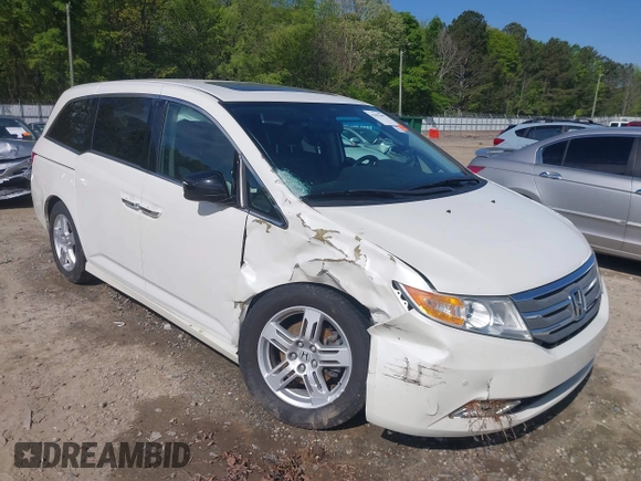 2013 Honda Odyssey Touring with VIN 5FNRL5H96DB009694, listed as a IAAI auction lot 42002487 with 182,867 mi miles and . Bid and sale history available at carsss.com. Image 6.