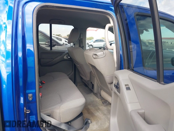 2014 Nissan Frontier SV with VIN 1N6AD0ER1EN765693, listed as a IAAI auction lot 41560914 with 165,572 mi miles and . Bid and sale history available at DreamBid. Image 8.