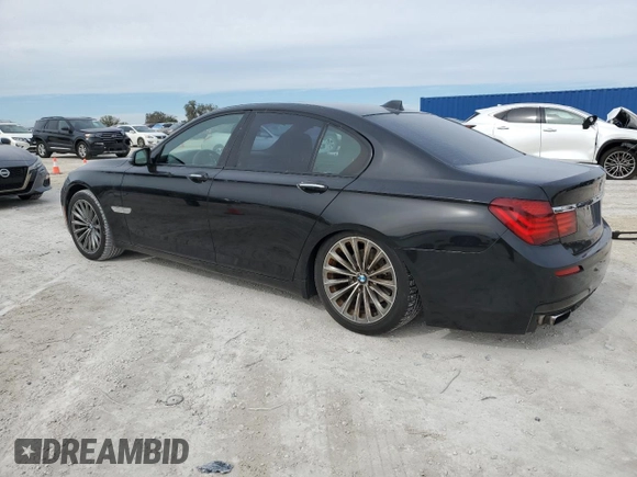 2015 BMW 7 Series 740i with VIN WBAYA6C50FD826727, listed as a Copart auction lot 82197433 with 241,799 mi miles and . Bid and sale history available at DreamBid. Image 2.