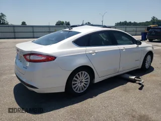 2015 Ford Fusion SE Hybrid z VIN 3FA6P0LU8FR105615, wystawiony jako Copart lot #61451155 z przebiegiem 106 778 mil mil oraz Szkoda całkowita • Salvage title. Historia ofert i sprzedaży dostępna na DreamBid. Obrazek 3.