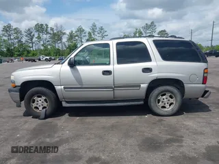 2006 Chevrolet Tahoe LS z VIN 1GNEC13V86R135510, wystawiony jako IAAI lot #42123092 z przebiegiem 370 153 mil mil oraz . Historia ofert i sprzedaży dostępna na DreamBid. Obrazek 14.