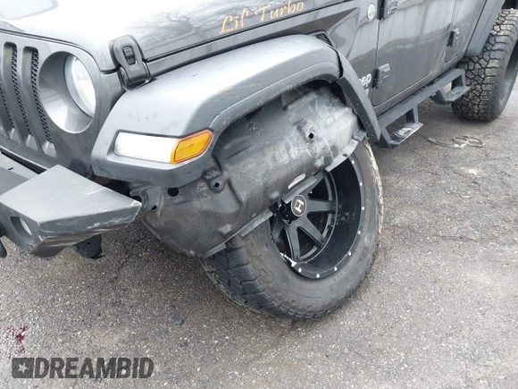 2020 Jeep Wrangler Unlimited Sport z VIN 1C4HJXDN3LW164701, wystawiony jako IAAI lot #41200437 z przebiegiem 102 272 mil mil oraz . Historia ofert i sprzedaży dostępna na DreamBid. Obrazek 6.