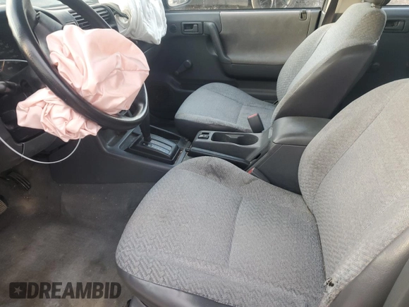 1999 Isuzu Rodeo S with VIN 4S2CK58W2X4312468, listed as a Copart auction lot 85753294 with Not Provided miles and Salvage Title. Bid and sale history available at DreamBid. Image 7.