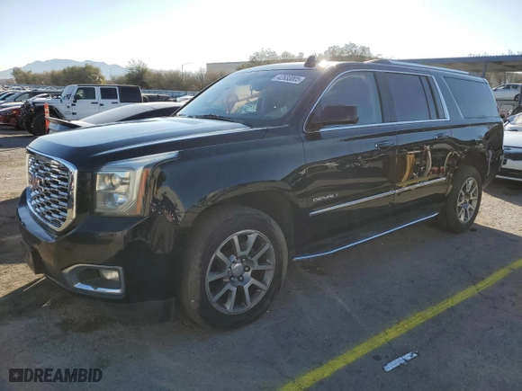 2019 GMC Yukon XL Denali with VIN 1GKS2HKJXKR368518, listed as a Copart auction lot 42833005 with 69,557 mi miles and Salvage Title. Bid and sale history available at carsss.com. Image 1.