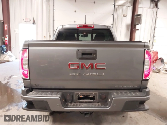 2021 GMC Canyon 4WD Denali with VIN 1GTG6EEN4M1287194, listed as a IAAI auction lot 41571729 with 21,704 mi miles. Bid and sale history available at carsss.com. Image 17.