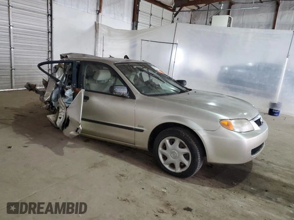 2002 Mazda Protege DX with VIN JM1BJ225021583998, listed as a Copart auction lot 49874135 with Not Provided miles and Non Repairable. Bid and sale history available at DreamBid. Image 4.