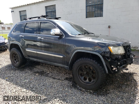2011 Jeep Grand Cherokee Limited with VIN 1J4RR5GT2BC677640, listed as a Copart auction lot 68012754 with 138,208 mi miles and Salvage title. Bid and sale history available at DreamBid. Image 4.