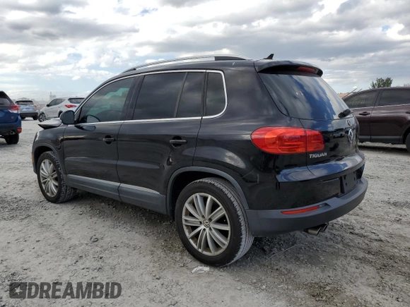 2014 Volkswagen Tiguan SE with VIN WVGAV3AXXEW543245, listed as a Copart auction lot 42288905 with 92,851 mi miles and Salvage title. Bid and sale history available at DreamBid. Image 2.