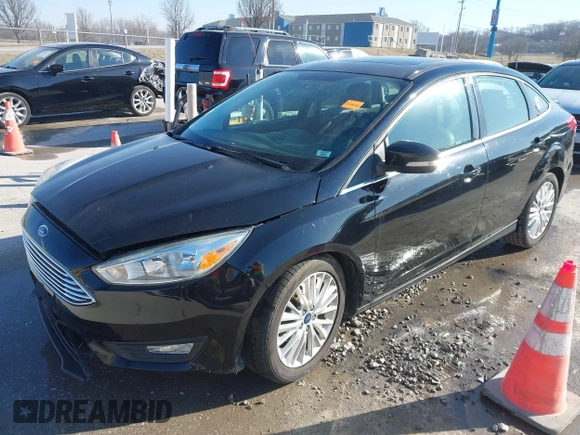 2017 Ford Focus Titanium с VIN 1FADP3J2XHL328847, выставлен на аукционе IAAI как лот 41740627 с пробегом 89 276 миль миль и . История ставок и продаж доступна на DreamBid. Изображение 2.