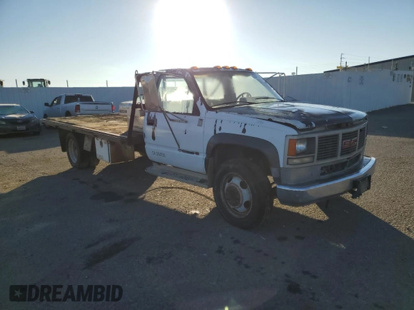 1991 GMC Sierra 1500 with VIN 1GDKC34N5MJ510668, listed as a Copart auction lot 42041115 with 294,934 mi miles and Clean Title. Bid and sale history available at DreamBid. Image 4.