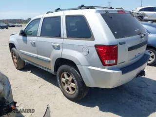 2008 Jeep Grand Cherokee Laredo with VIN 1J8GS48K28C161376, listed as a IAAI auction lot 42048390 with 206,679 mi miles. Bid and sale history available at carsss.com. Image 3.