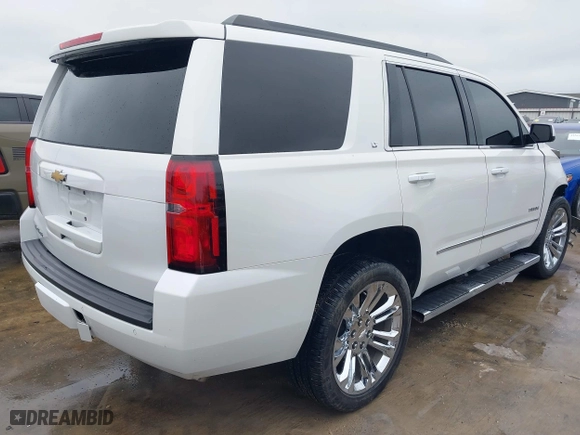 2018 Chevrolet Tahoe LT with VIN 1GNSCBKC5JR323595, listed as a IAAI auction lot 41550552 with 115,697 mi miles. Bid and sale history available at carsss.com. Image 4.