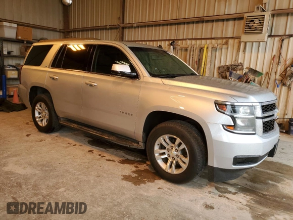2015 Chevrolet Tahoe LS with VIN 1GNSCAKC0FR281838, listed as a Copart auction lot 51745675 with 151,483 mi miles and Clean title. Bid and sale history available at DreamBid. Image 4.
