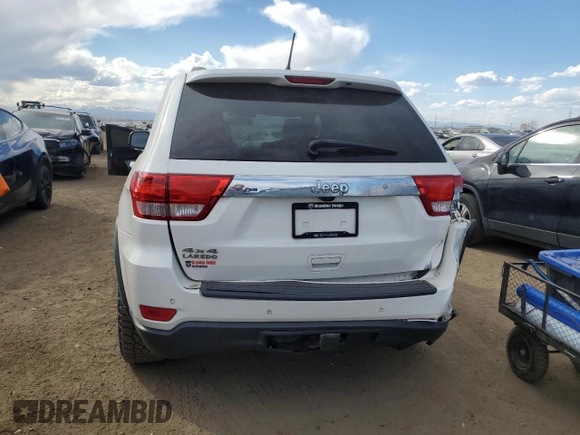 2011 Jeep Grand Cherokee Laredo with VIN 1J4RR4GG8BC718852, listed as a Copart auction lot 49852535 with 101,945 mi miles and Salvage Title. Bid and sale history available at carsss.com. Image 6.