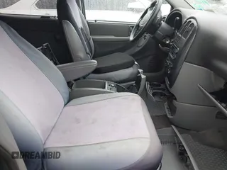 2005 Dodge Caravan SXT with VIN 1D4GP45R55B279825, listed as a IAAI auction lot 42532684 with 157,167 mi miles and . Bid and sale history available at DreamBid. Image 5.