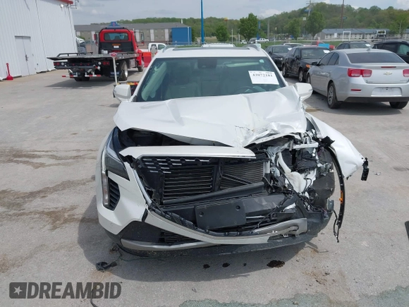 2022 Cadillac XT4 FWD Premium Luxury with VIN 1GYFZCR44NF144494, listed as a IAAI auction lot 42072181 with 41,891 mi miles and . Bid and sale history available at DreamBid. Image 12.