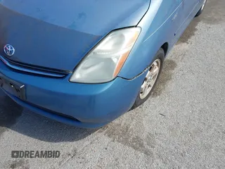 2007 Toyota Prius z VIN JTDKB20U677595987, wystawiony jako IAAI lot #41876974 z przebiegiem 218 650 mil mil oraz . Historia ofert i sprzedaży dostępna na DreamBid. Obrazek 6.