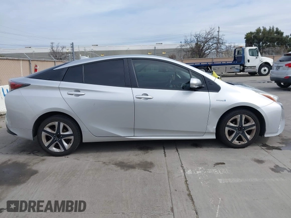 2016 Toyota Prius Four with VIN JTDKARFU9G3008336, listed as a IAAI auction lot 41710594 with 224,479 mi miles and . Bid and sale history available at DreamBid. Image 13.