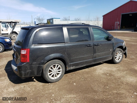2009 Dodge Grand Caravan SE with VIN 2D8HN44E69R695008, listed as a Copart auction lot 49772715 with 240,982 mi miles and Salvage Title. Bid and sale history available at carsss.com. Image 3.