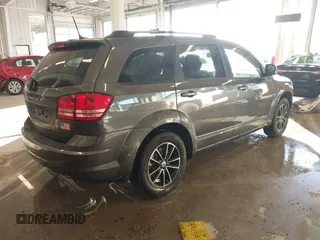 2018 Dodge Journey SE with VIN 3C4PDCAB1JT519745, listed as a IAAI auction lot 41366307 with 131,436 mi miles. Bid and sale history available at carsss.com. Image 4.