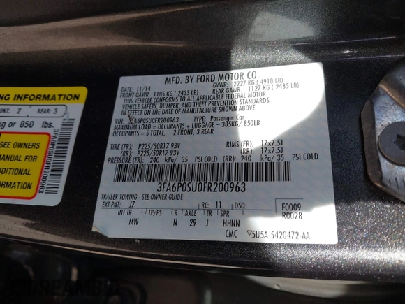 2015 Ford Fusion Energi Titanium with VIN 3FA6P0SU0FR200963, listed as a IAAI auction lot 41897182 with 104,100 mi miles. Bid and sale history available at carsss.com. Image 9.