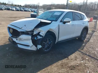 2017 Mazda CX-5 Touring with VIN JM3KFBCL4H0125501, listed as a IAAI auction lot 41979179 with 109,926 mi miles. Bid and sale history available at carsss.com. Image 2.