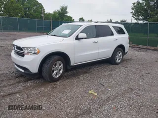 2013 Dodge Durango Crew with VIN 1C4RDJDGXDC693933, listed as a IAAI auction lot 42201796 with 169,051 mi miles and . Bid and sale history available at DreamBid. Image 2.