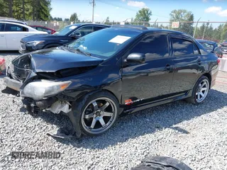 2009 Toyota Corolla with VIN 1NXBU40E69Z083628, listed as a IAAI auction lot 42093559 with 171,239 mi miles. Bid and sale history available at carsss.com. Image 2.