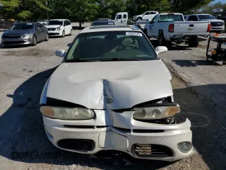 2003 Oldsmobile Aurora z VIN 1G3GS64C034160957, wystawiony jako Copart lot #76566524 z przebiegiem Nie podano mil oraz Szkody całkowita. Historia ofert i sprzedaży dostępna na DreamBid. Obrazek 5.
