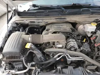 2020 Ram 1500 Big Horn z VIN 1C6RREBT5LN300410, wystawiony jako Copart lot #65036335 z przebiegiem 109 943 mil mil oraz Szkoda całkowita • Salvage title. Historia ofert i sprzedaży dostępna na DreamBid. Obrazek 13.